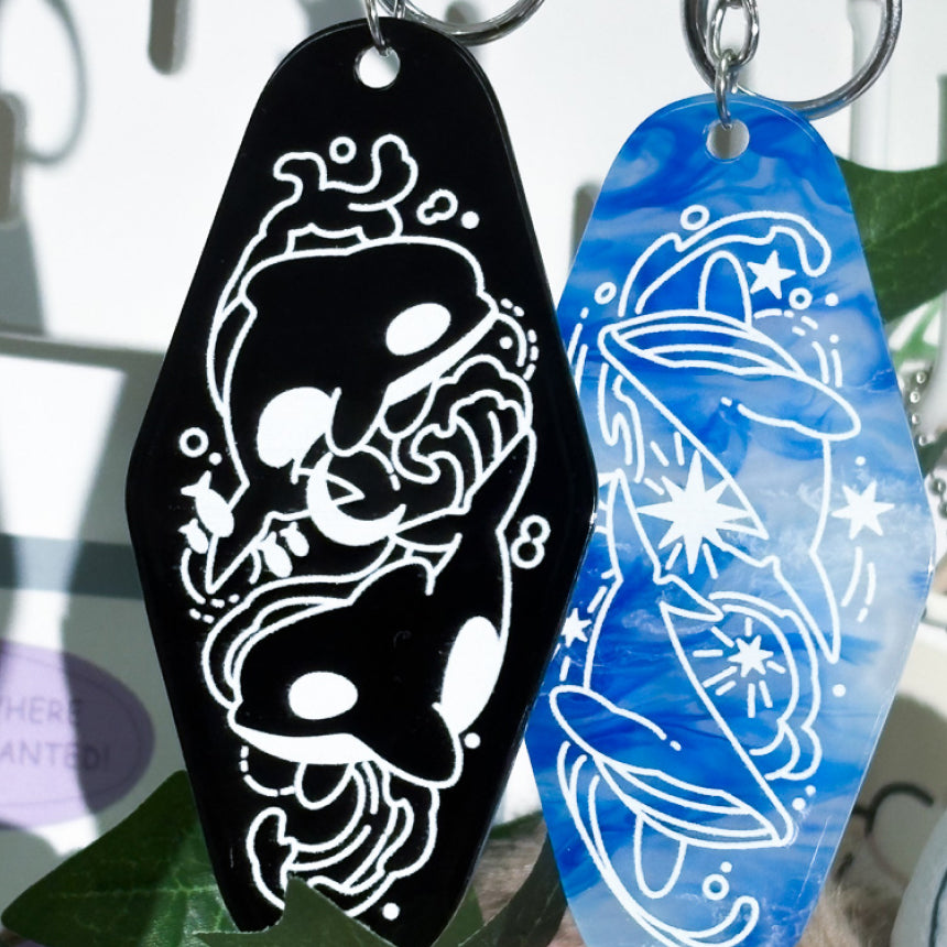 Light in the Dark and Blue Meteor Light Acrylic Keychains